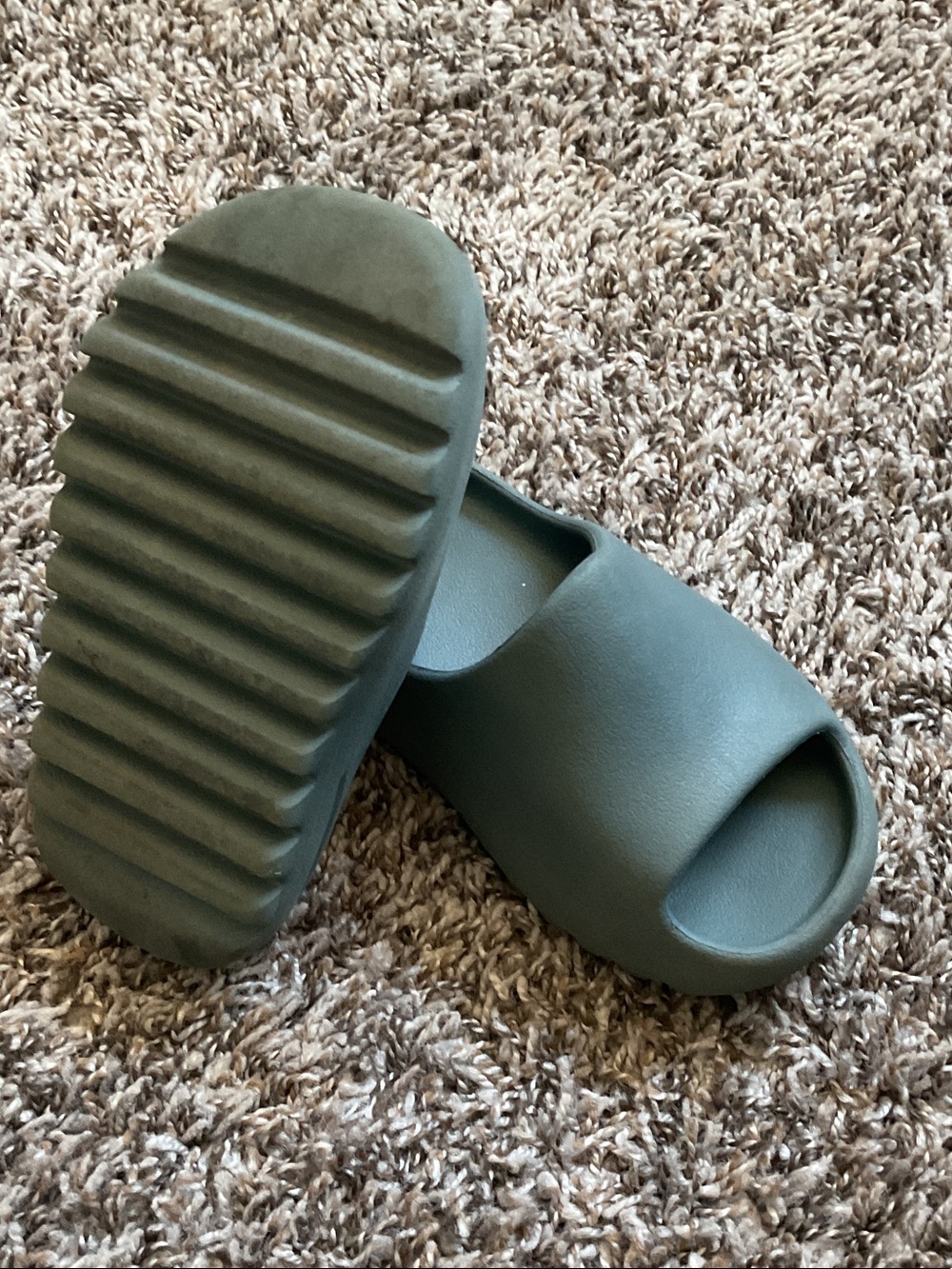 Kids grey Yeezy Slide Sandals. Lightly worn.